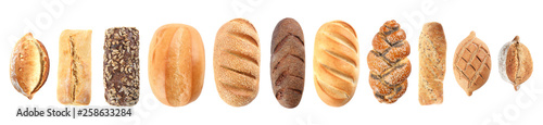 Set of fresh bread on white background, top view