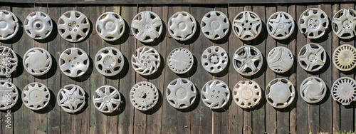 Big collection hubcaps on wall