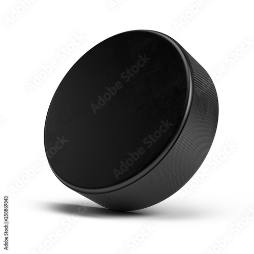 Hockey puck isolated on white - 3d rendering