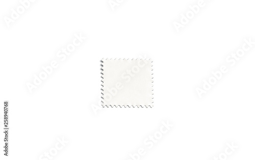 Blank white square postage stamp mockup, isolated, depth of field, 3d rendering. Empty mark for letter mock up, top view. Clear postal sticker for philately or mailing template.