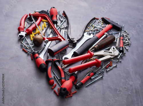 Heart shaped arrangement of assorted hand tools