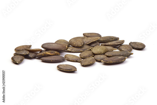 Stack of Black Melon Seeds, close-up, isolated on white background