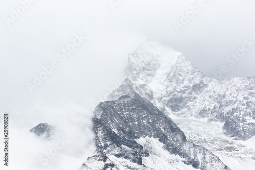The mountains are covered with clouds. Nepal. Everest trekking