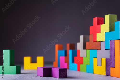 Geometric shapes on a wooden background.