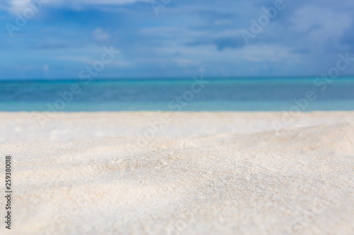 White sand background and decoration of sea sky and sun