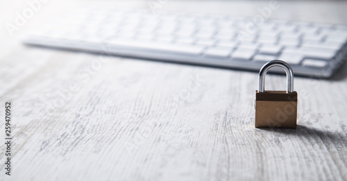 Padlock with computer keyboard. Internet and computer security