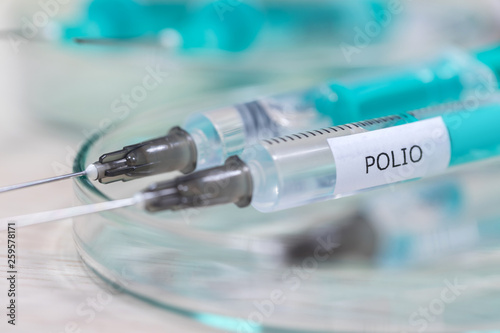 polio vaccination syringe background