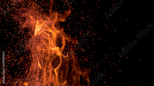 MACRO, DOF: Cinematic shot of flames flickering in the darkness of the night.