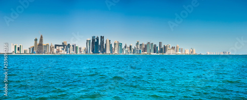 Panorama of city of Doha, Qatar downtown with skyscrapers, view from sea bay