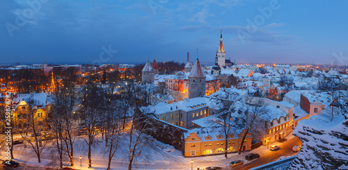 Aerial view. Magic snowy old town of Tallinn, Estonia, nightscape.