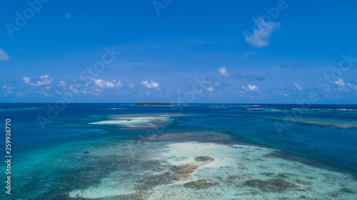 Aerial View to San Blas island of Panama. The San Blas islands of Panama is an archipelago comprising 365 islands and cays of which 49 are inhabited