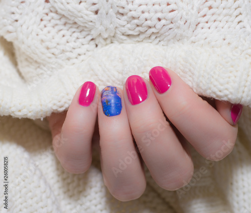 pink nails on white background