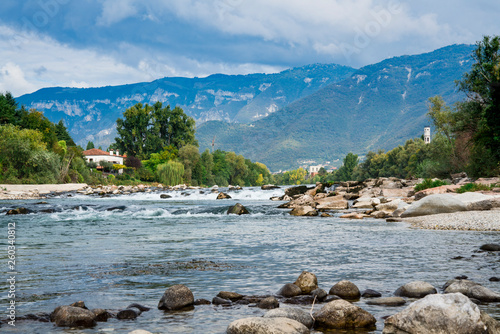 waterfall and rocks in river Brenta in Bassano del Grappa, Italy