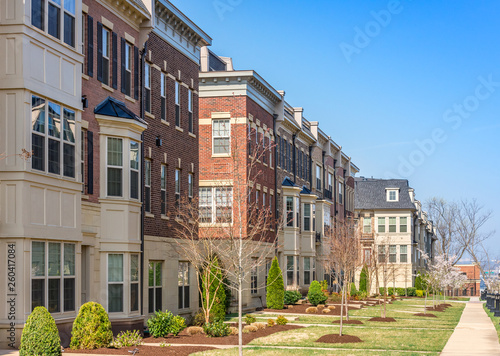 Luxury townhouses in Washington DC National Harbor Potomac Overlook with Brick facade and French style mansard roof