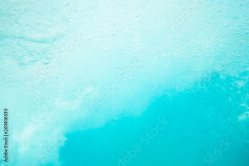 background image of water surface, blue sea, bubbles