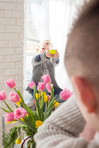 Kids playing with water on Dyngus Day on Easter Monday in Poland. 