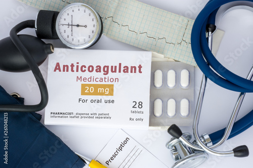 Anticoagulant drug for blood, for prevention or prophylaxis of vascular diseases of heart or brain. Packing of pills with inscription "Anticoagulant Medication" on table