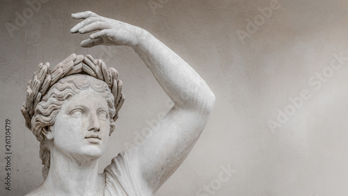 Statue of sensual Roman renaissance era woman in circlet of bay leaves, Potsdam, Germany, details, closeup