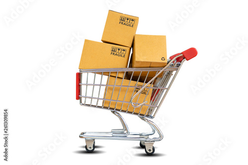 Online Shopping and delivering concept - Shopping cart with product package boxes isolated on white background