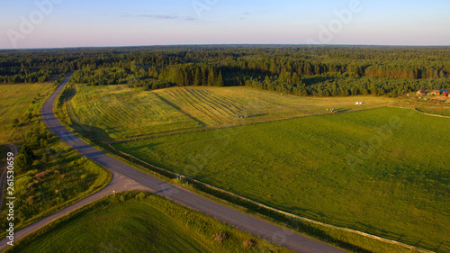 Top view of the road through the agricultural field