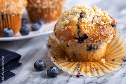 Blueberry Muffin With Berries on a Marble Surface