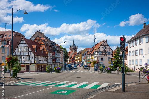 Street with beautiful half-timbered houses in the historic center of Selestat in Alsace.