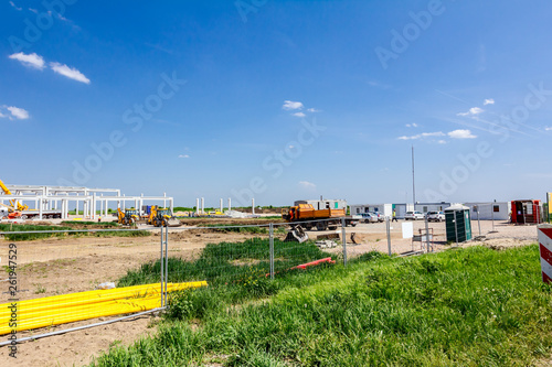 View on the construction site over fence wire