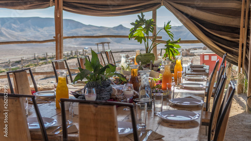 Bedouin hospitality dinner table in a tent- Israel desert