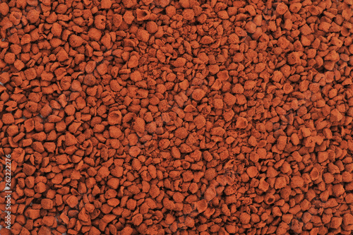 Brown instant coffee powder background and texture