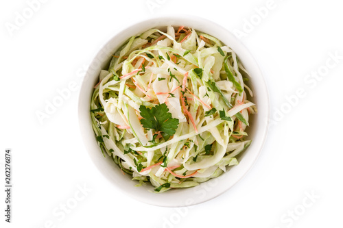 Coleslaw salad in white bowl isolated on white background. Top view