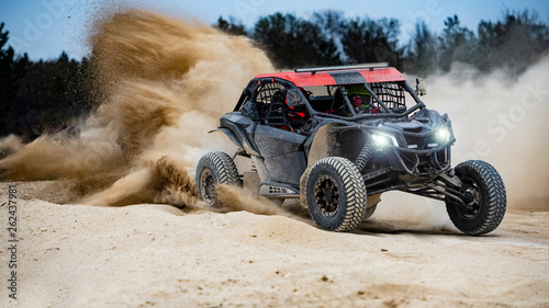 UTV buggy in the action on sand