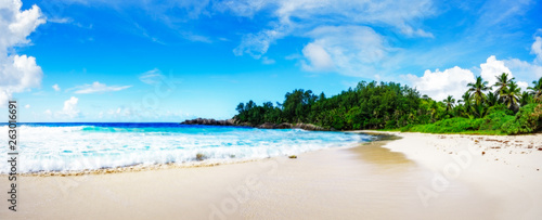 panorama of tropical beach.palms,granite rocks and turquoise water,seychelles 1