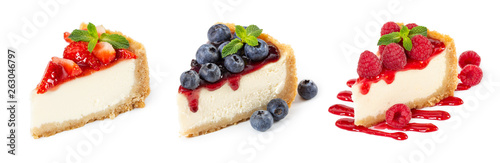 Set of cheesecakes with fresh berries and mint