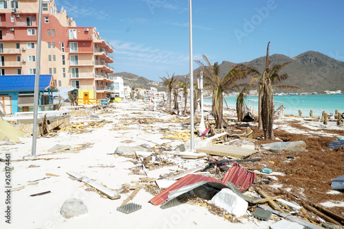 Philipsburg Sint maarten: Board walk and buildings completely covered with beach sand and debris after island got hit by hurricane Irma. 