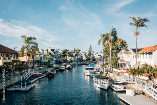 Boats and houses along a canal in Naples, Long Beach, California