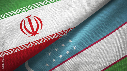 Iran and Uzbekistan two flags textile cloth, fabric texture