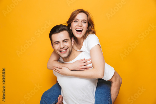 Portrait of a cheerful young couple standing