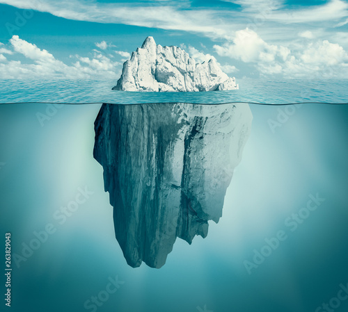 Iceberg in ocean. Hidden threat or danger concept. Central composition. Toned green.