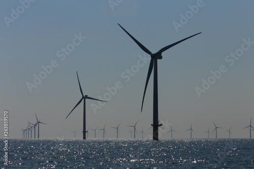 view of windmills of Rampion windfarm off the coast of Brighton, Sussex, UK