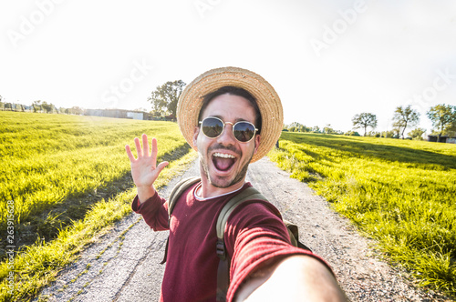 Man taking a selfie on a nature background