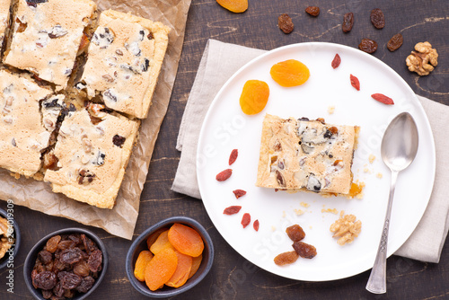 Traditional Polish Easter cake called Mazurek with plenty of dried fruits and nuts, top view