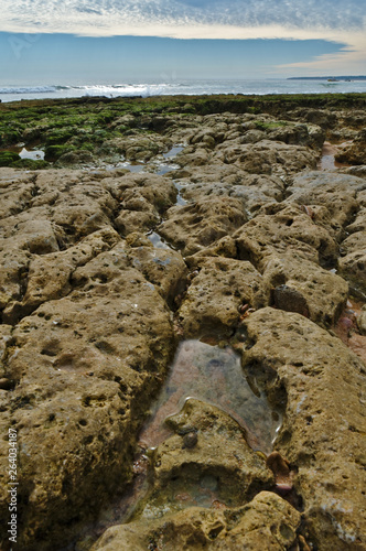 Sea rocks in Gale beach. Albufeira, Portugal
