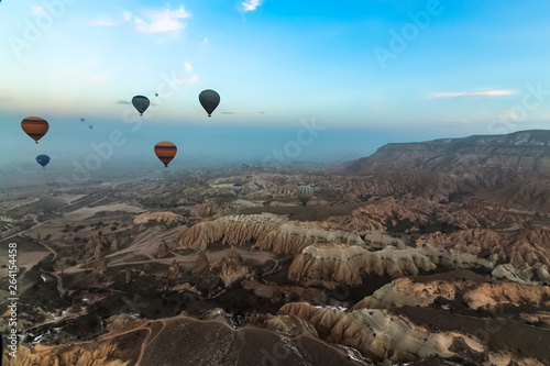 Panorama view of hot air balloons flying over Cappadocia