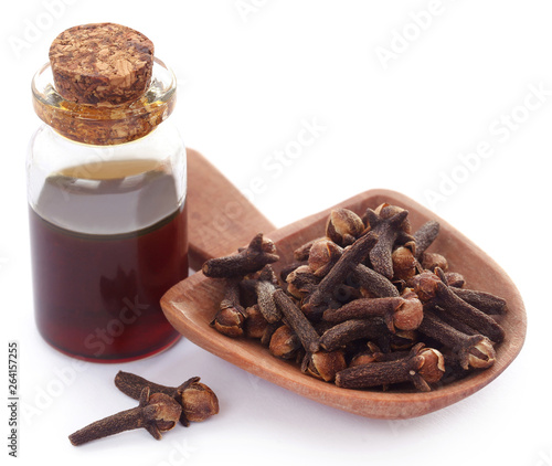 Fresh clove with oil in a jar