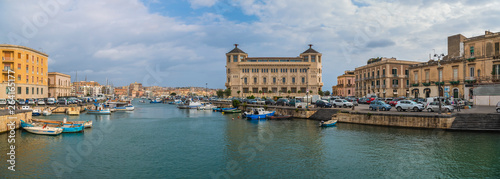 Panoramic view of the island Ortigia and cityscape of Siracusa from the bridge Umbertino in Sicily, Italy