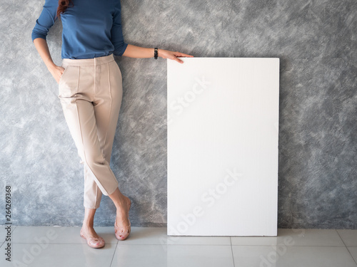 Asian woman with white banner copy space