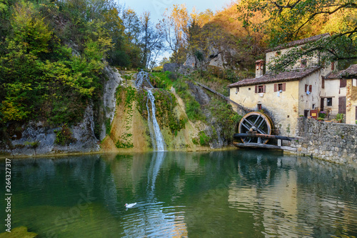 Ancient watermill wheel, Molinetto della Croda in Lierza valley. Refrontolo. Italy