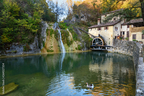 Ancient watermill wheel, Molinetto della Croda in Lierza valley. Refrontolo. Italy