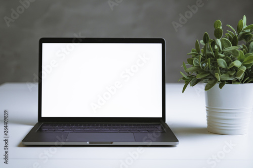 Latest generation computer on a table with accessories