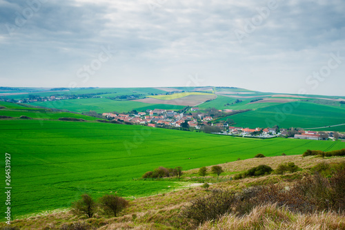 view on the landscape and the village l' Escale when mounting the cliff of Cap Blanc Nez in springtime in the region of Nord Pas de Calais